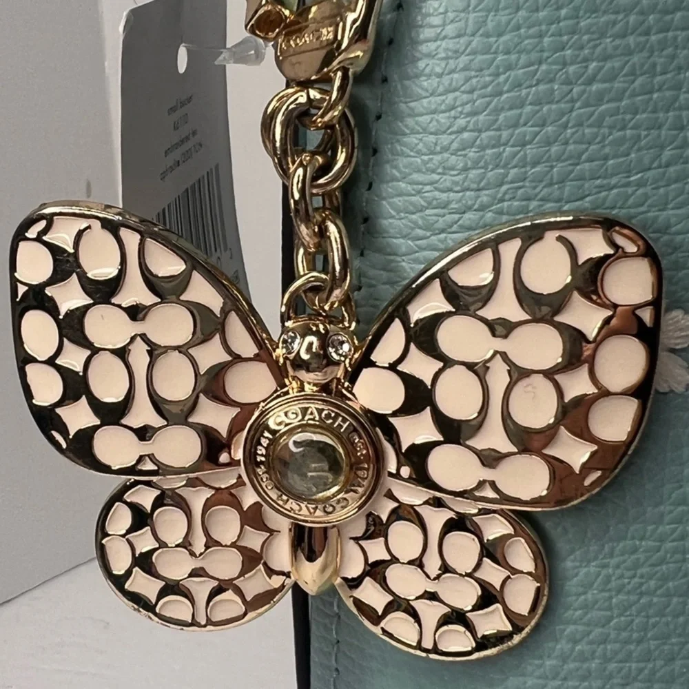 Coach Butterfly White and Gold Enamel Metal Keychain Fob Charm Rare